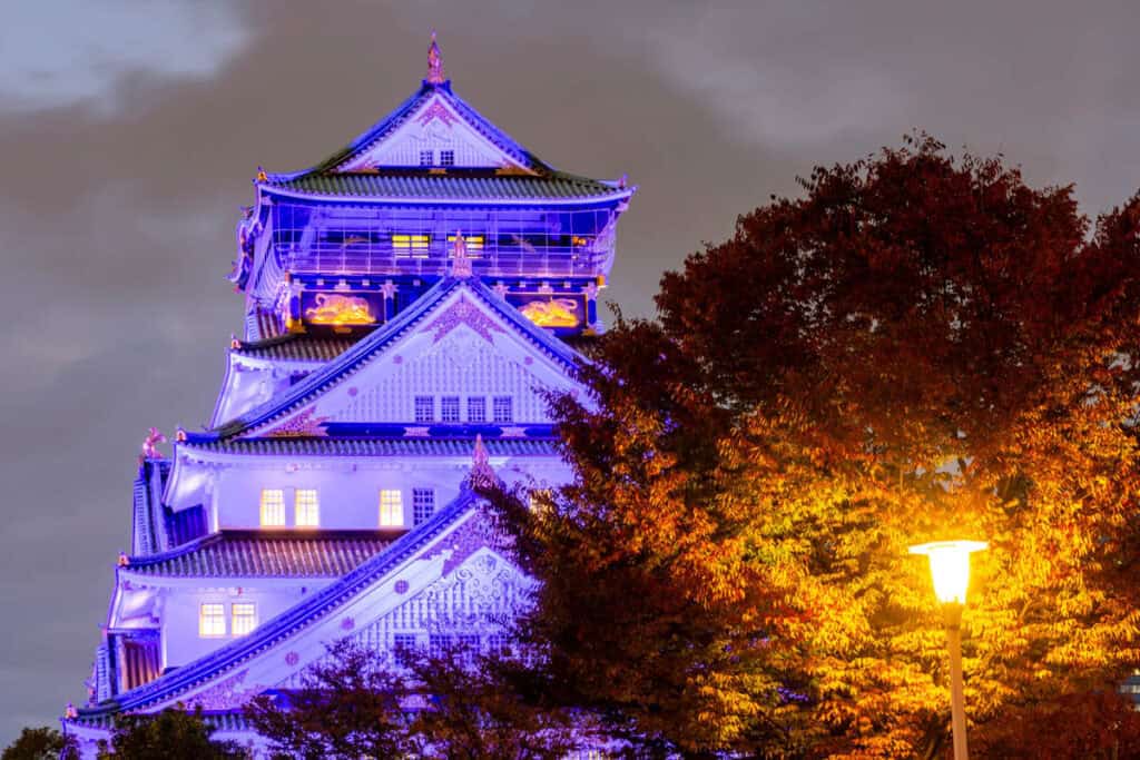 Osaka Castle in Osaka, Japan, lit up after dark